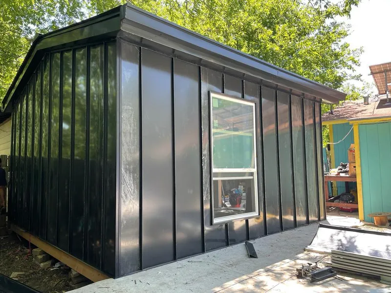 Black standing seam metal wall panels for Metal Roof Installation in Walpole