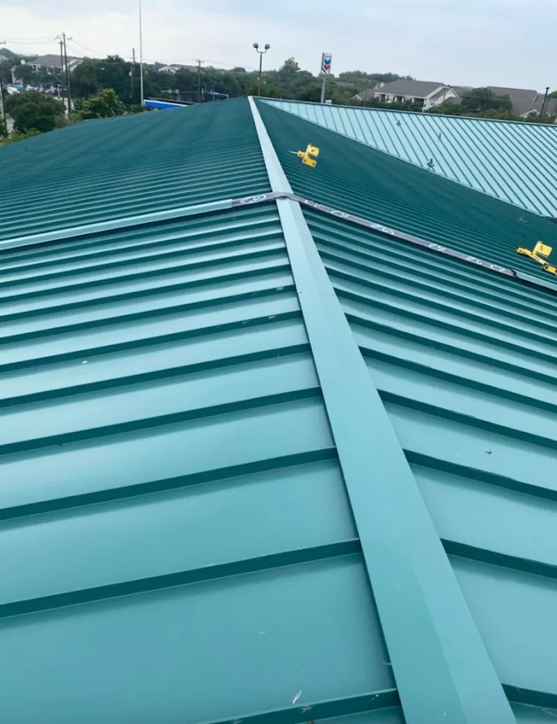Green commercial metal roof ridge and valley for Metal Roof Repair in Walpole