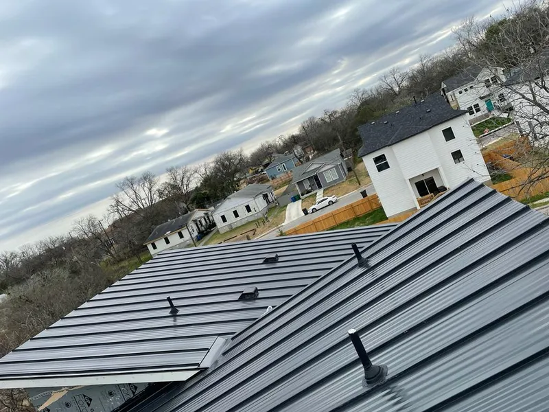 Standing seam metal roof panels with vents for Skylight Repair in Walpole